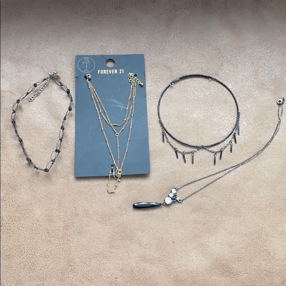 Four piece necklace lot